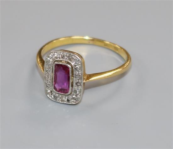 A 1920s/1930s 18ct gold and platinum ruby and diamond tablet ring, size M.